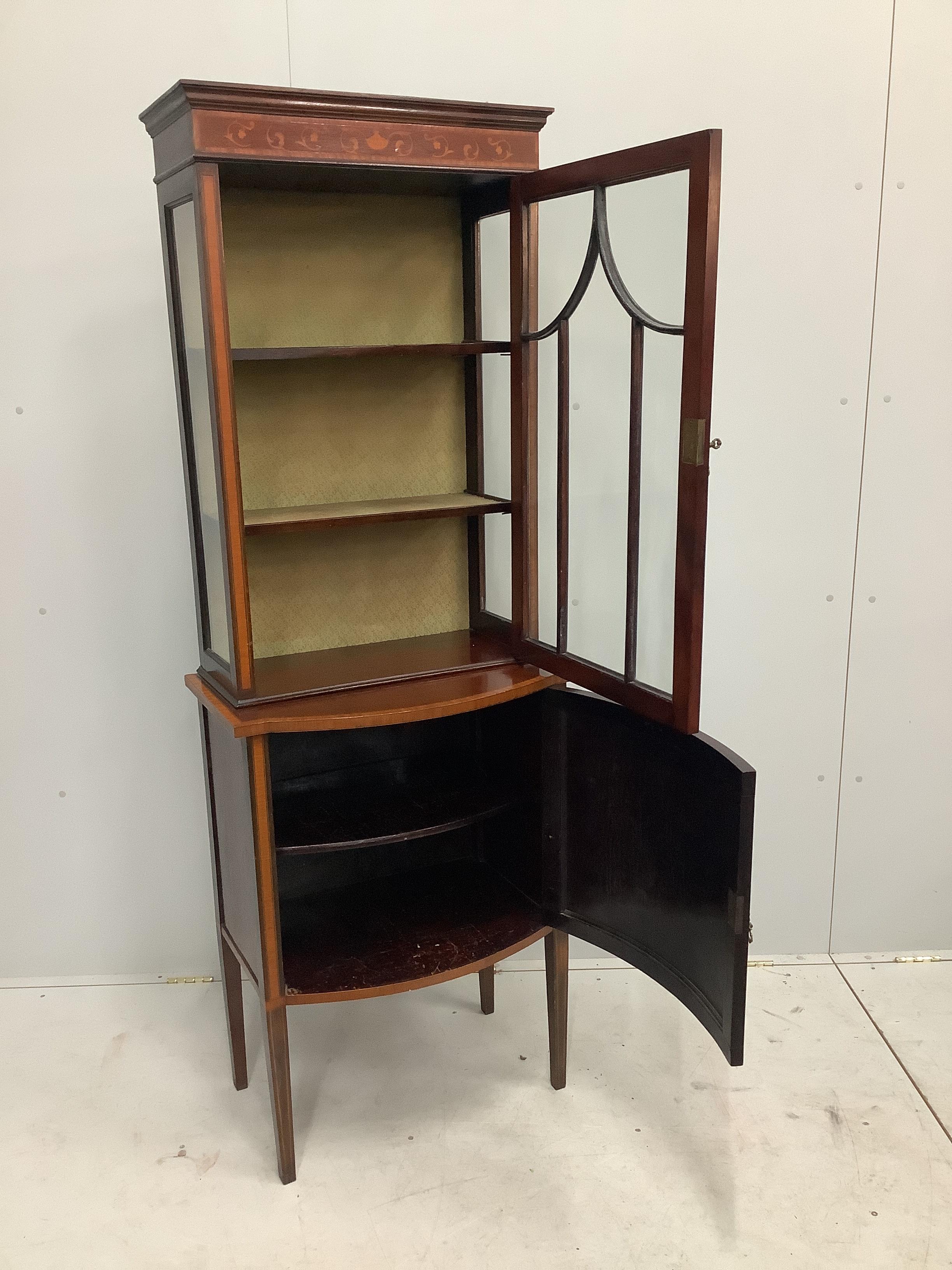 An Edwardian inlaid mahogany bowfront display cabinet, width 66cm, depth 42cm, height 185cm